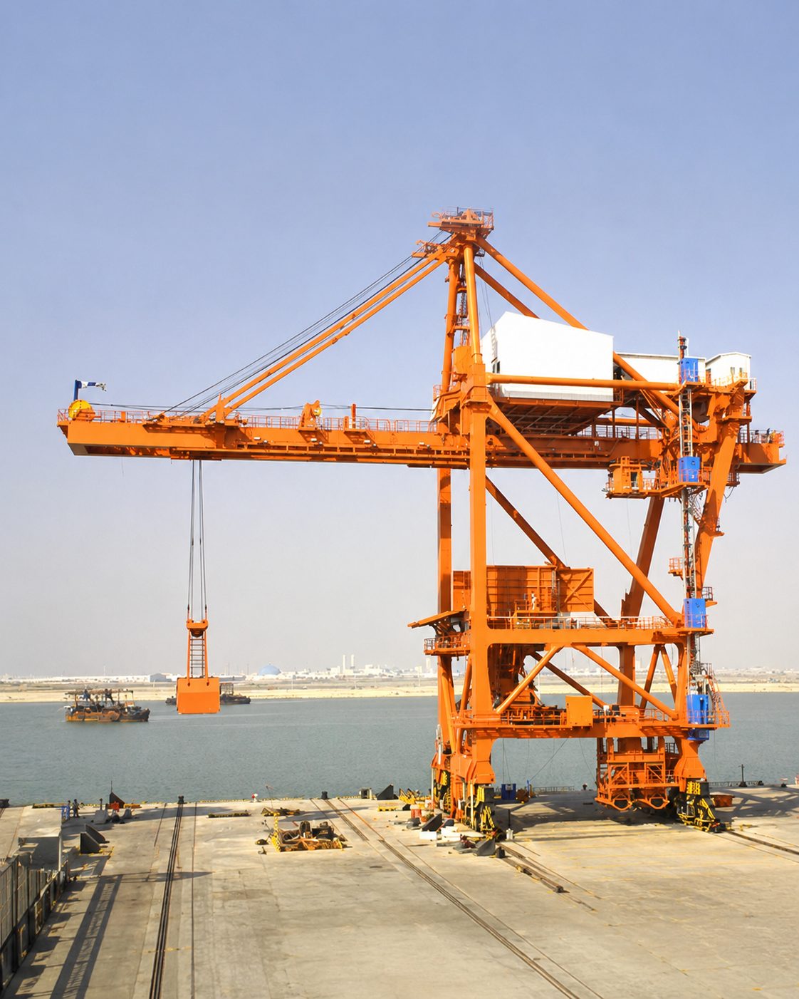 A grab unloader on a quayside